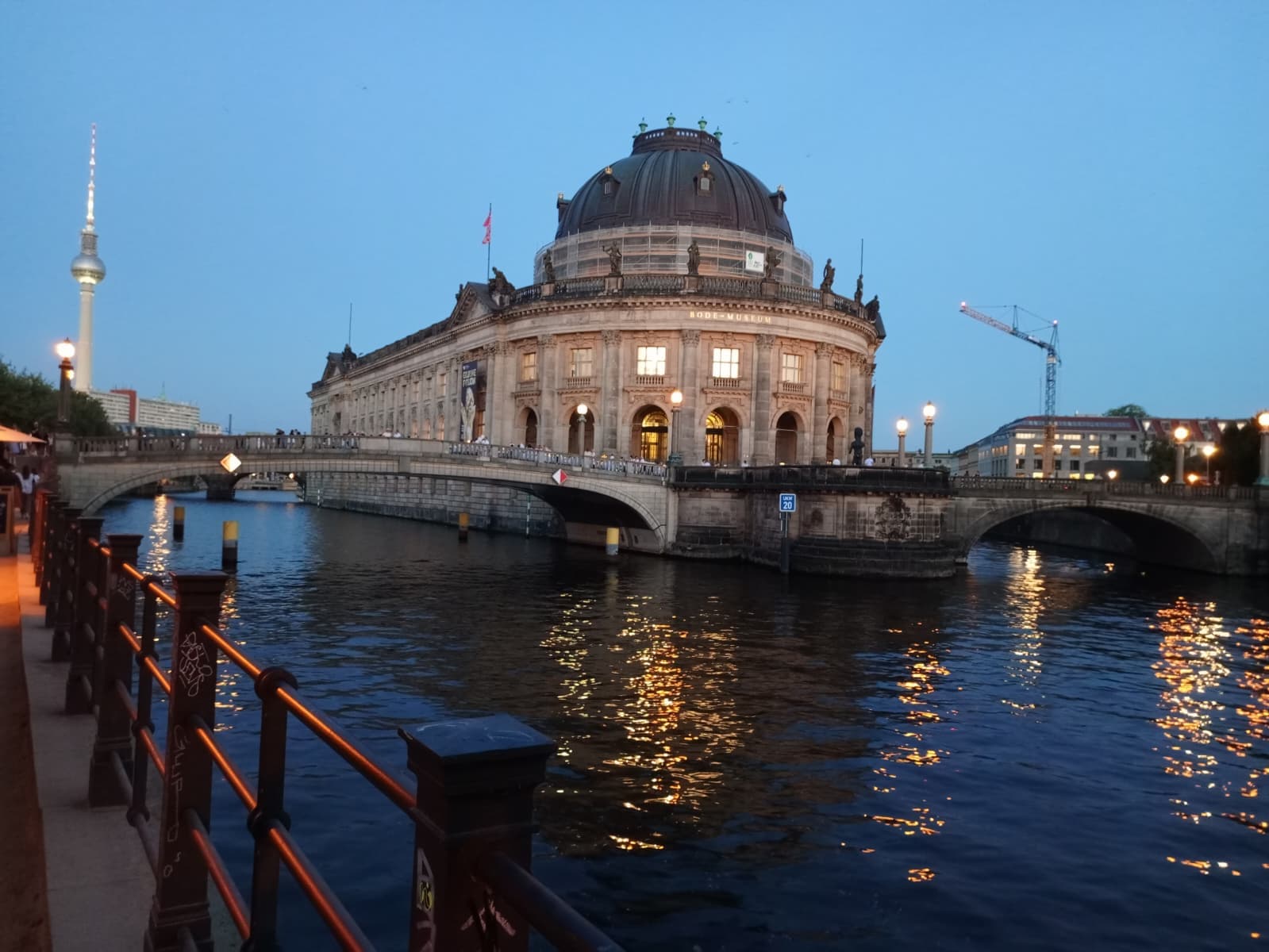 Evening riverside view of the Bode Museum and TV Tower.