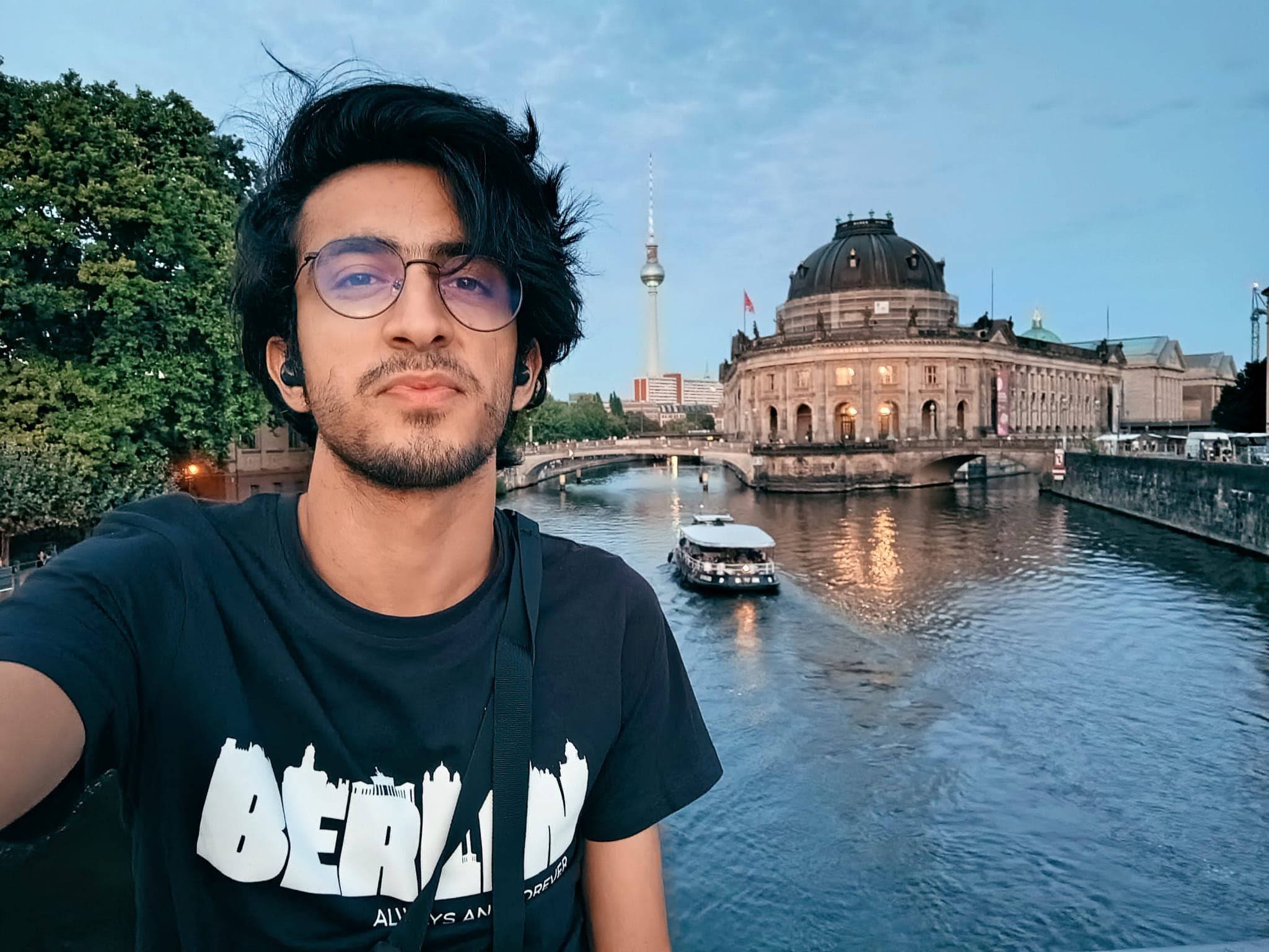 Selfie on a bridge with the Bode Museum and TV Tower behind.