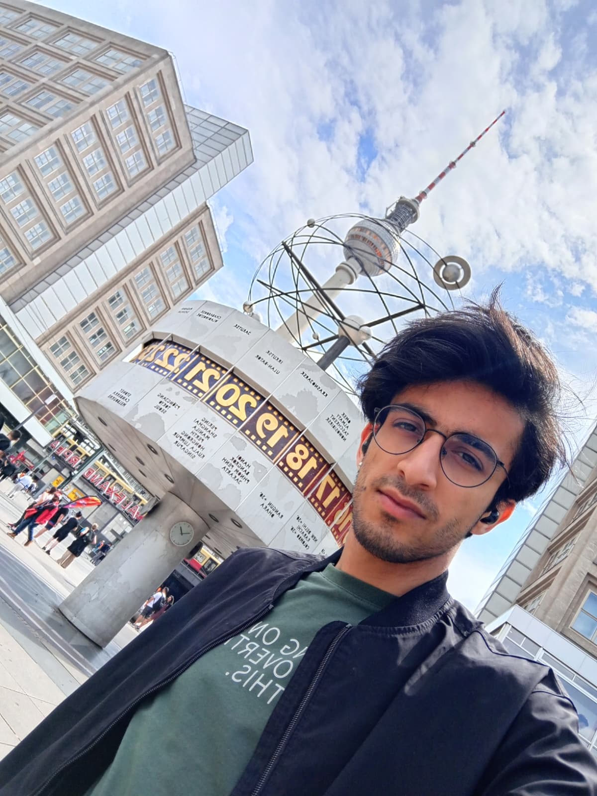 At Alexanderplatz with the World Clock and TV Tower in the background.