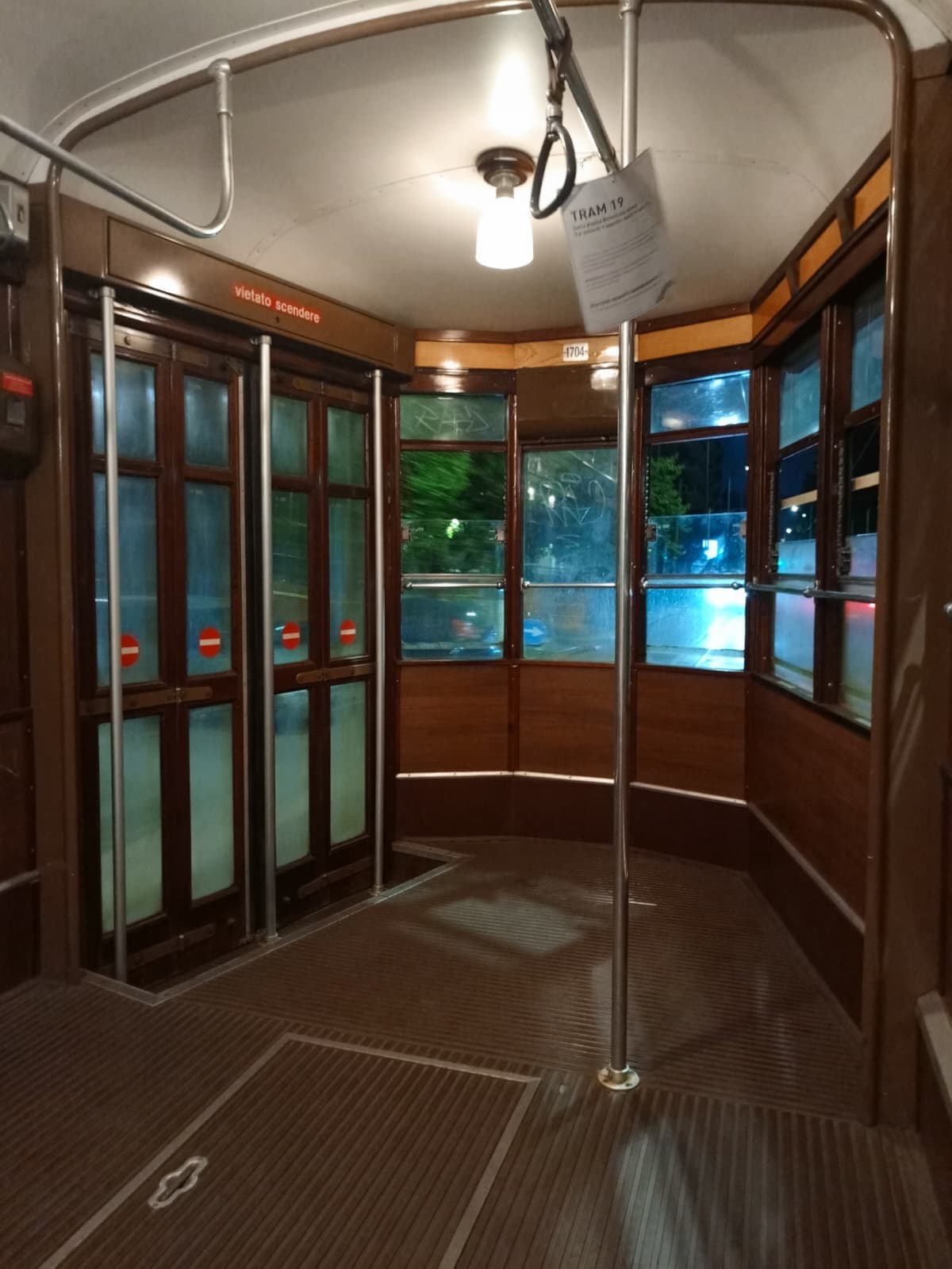 Inside a classic wooden Milan tram.