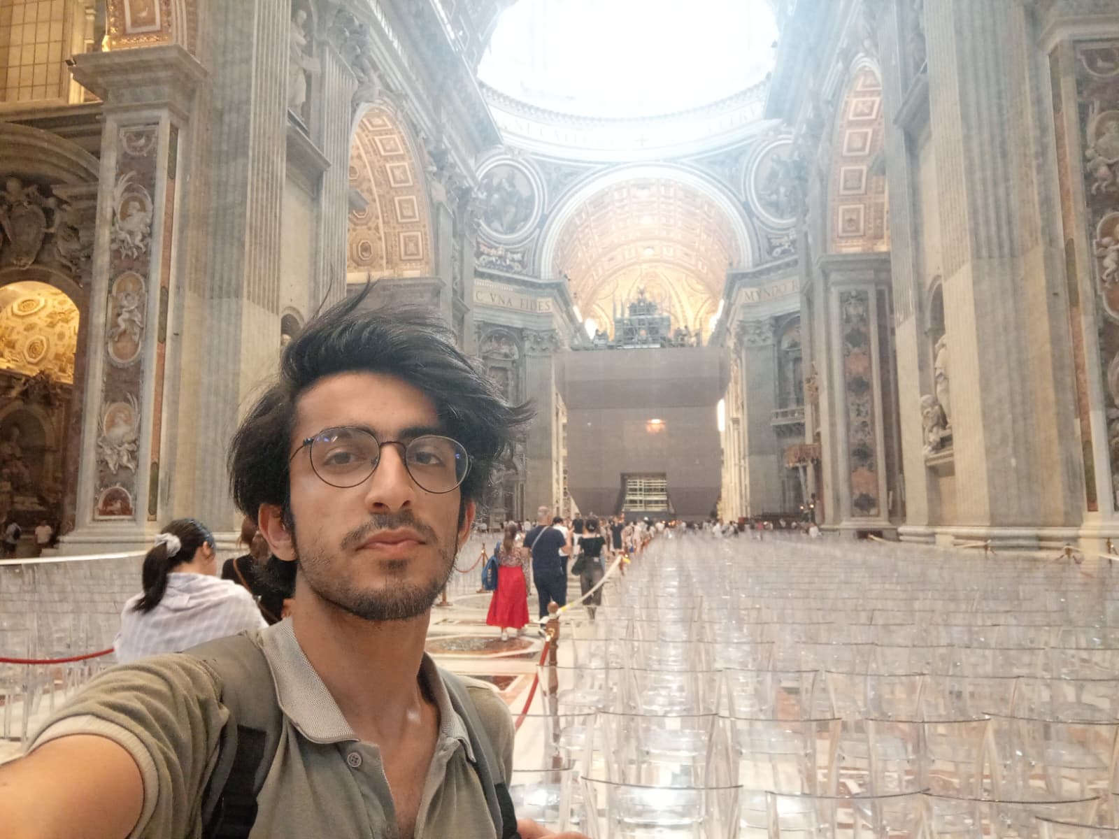 Inside St. Peter’s Basilica, surrounded by grand architecture and intricate details.