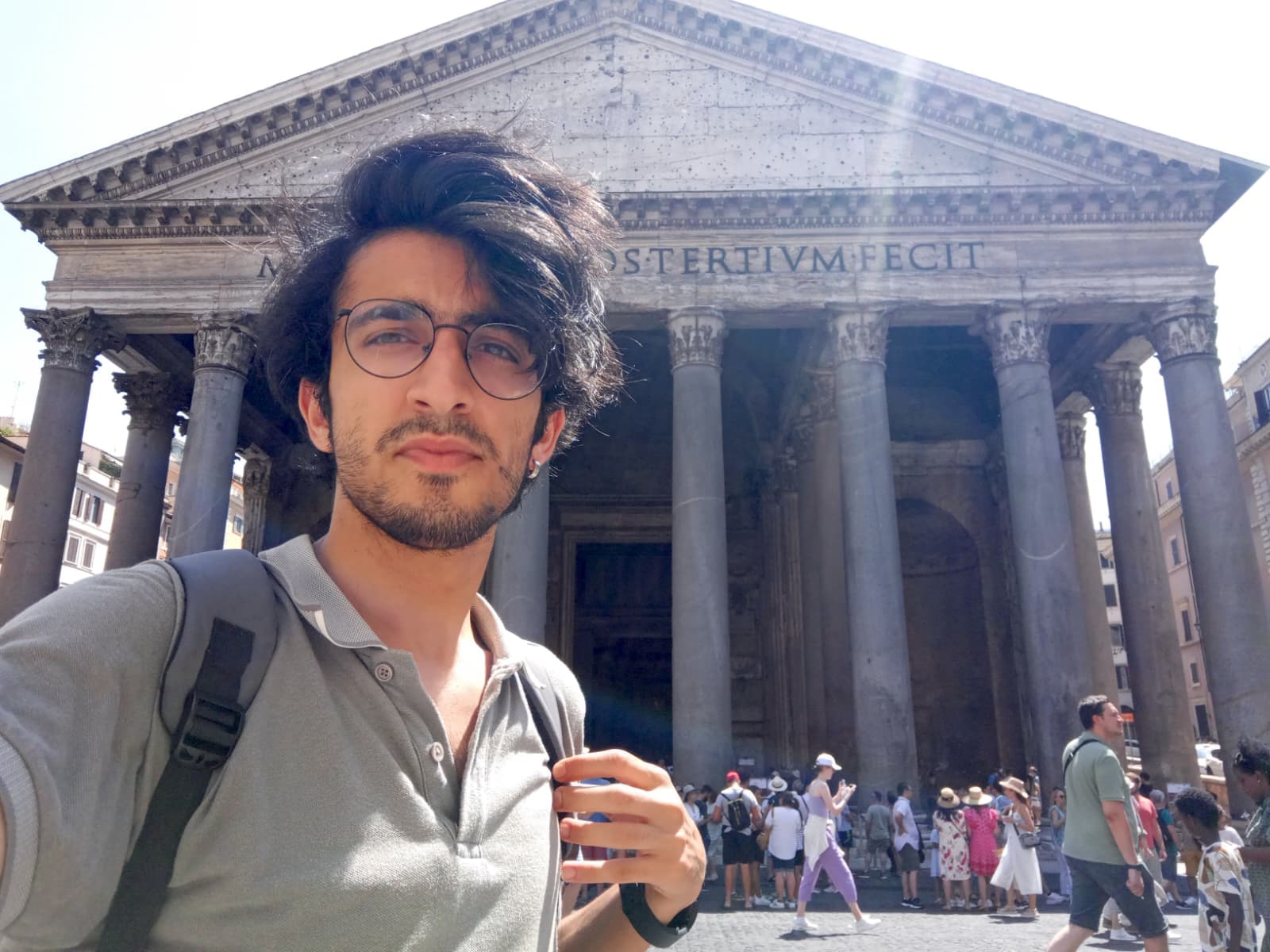 Standing in front of the Pantheon, one of the best-preserved ancient Roman buildings.