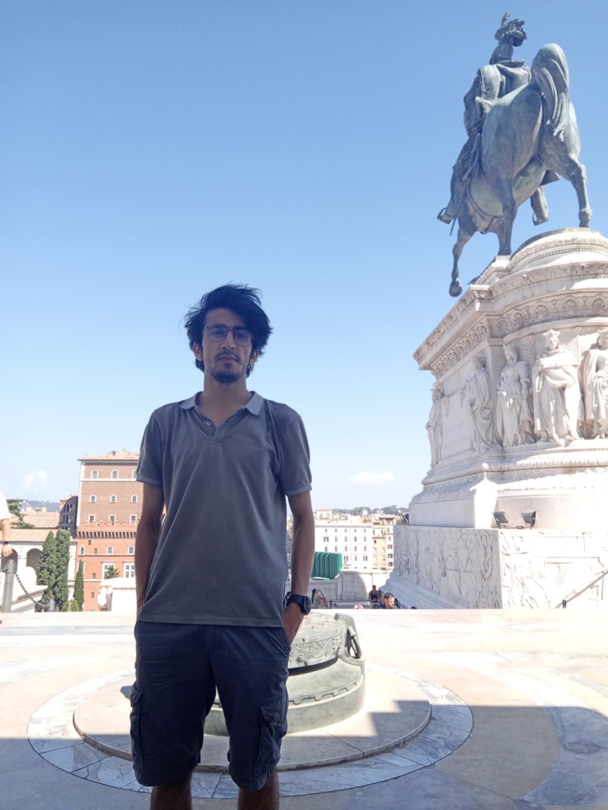 Standing by the statue of Victor Emmanuel II at the Altare della Patria.