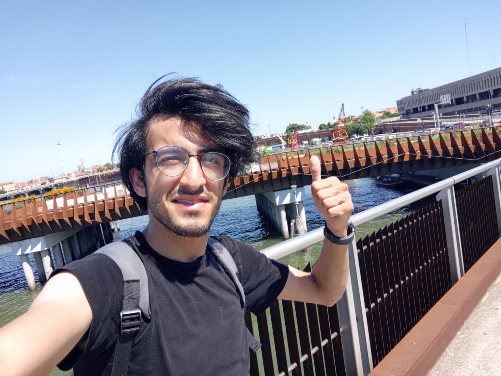 Giving a thumbs-up at the entrance bridge to Venice.