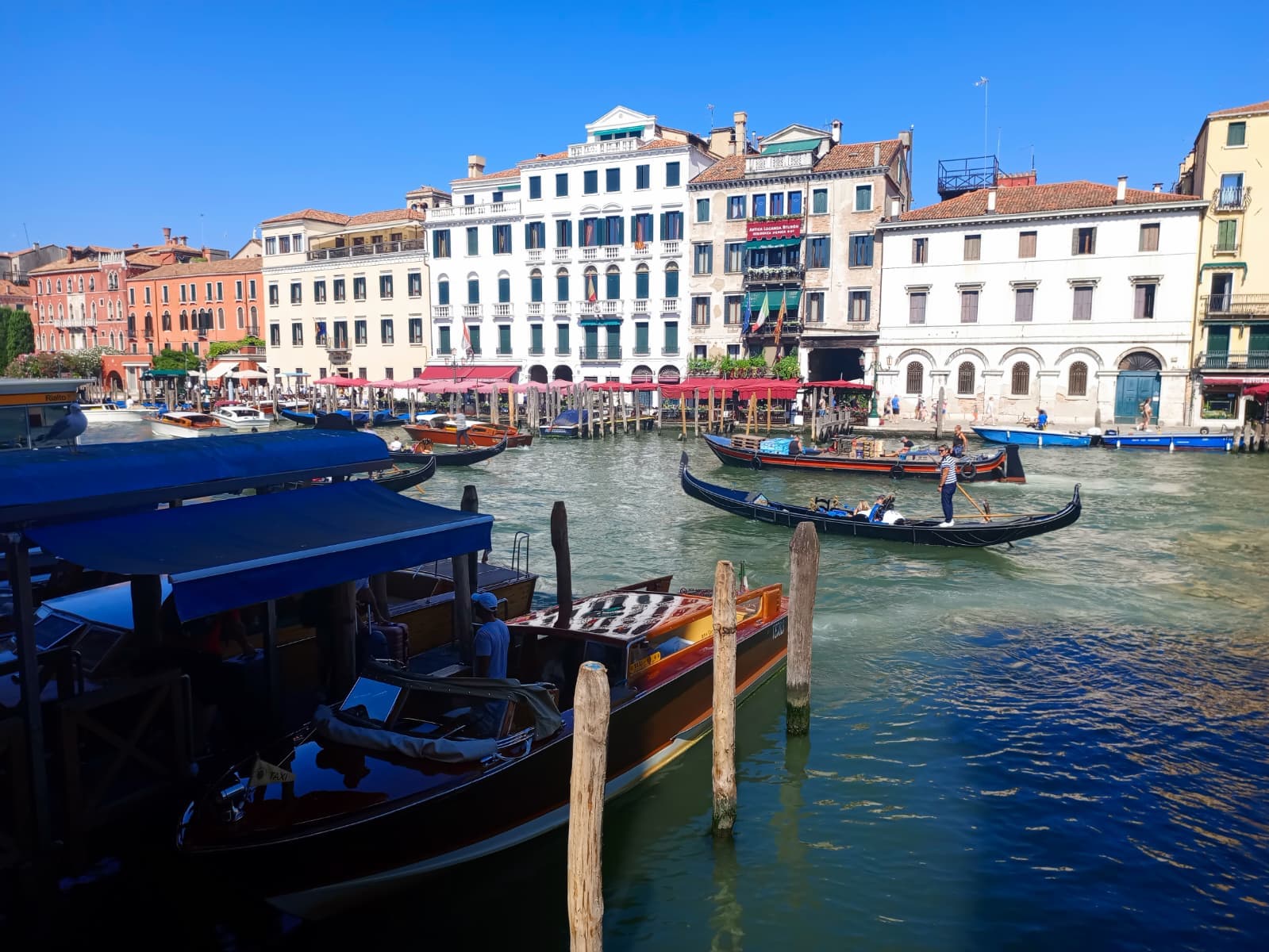 Colorful waterfront buildings lining the Grand Canal.