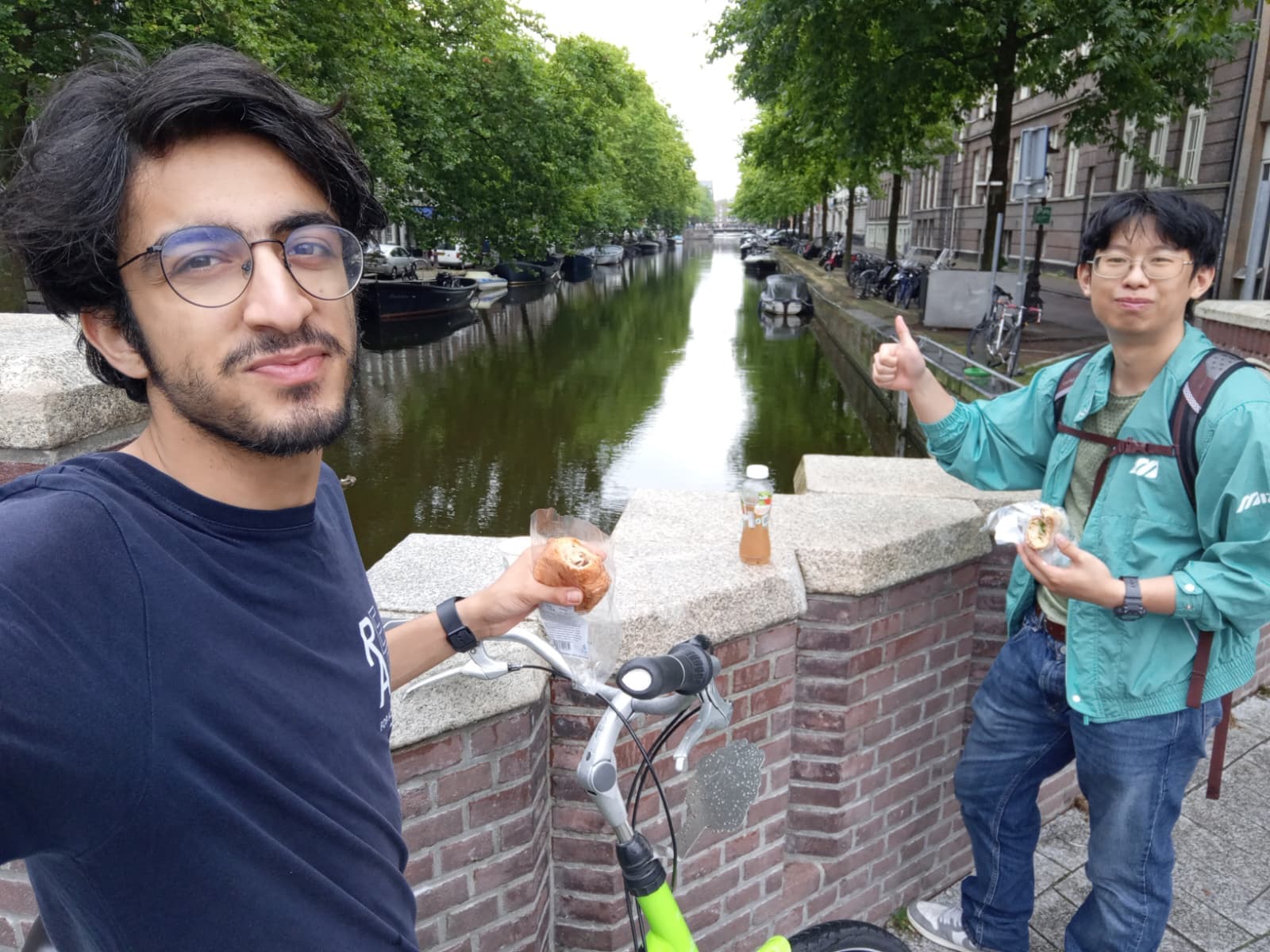 Quick snack stop with Jun Chao while cycling along the canals.