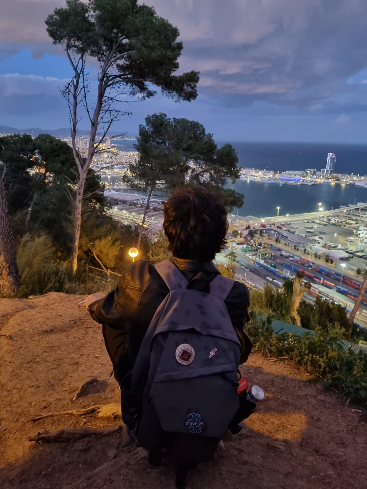 Watching the Barcelona port lights from the top of Montjuïc in the evening.