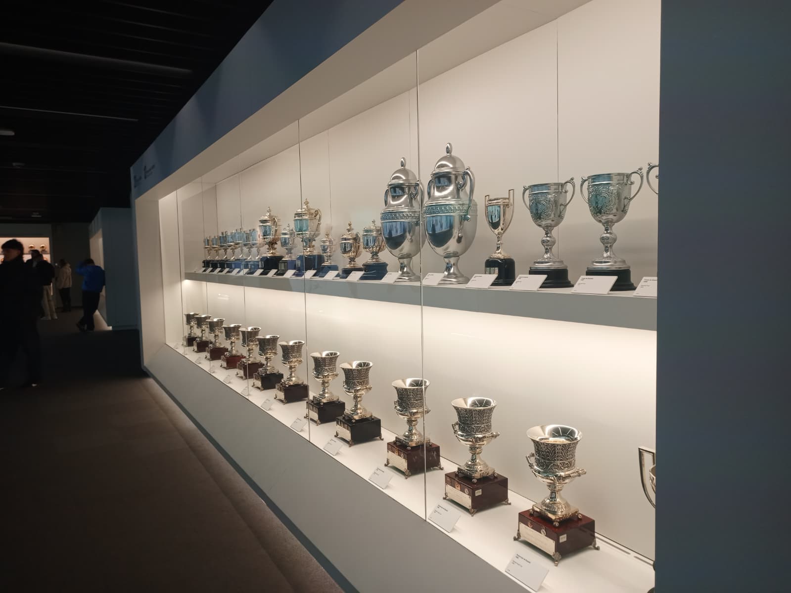 A showcase of gleaming trophies at the Real Madrid museum.